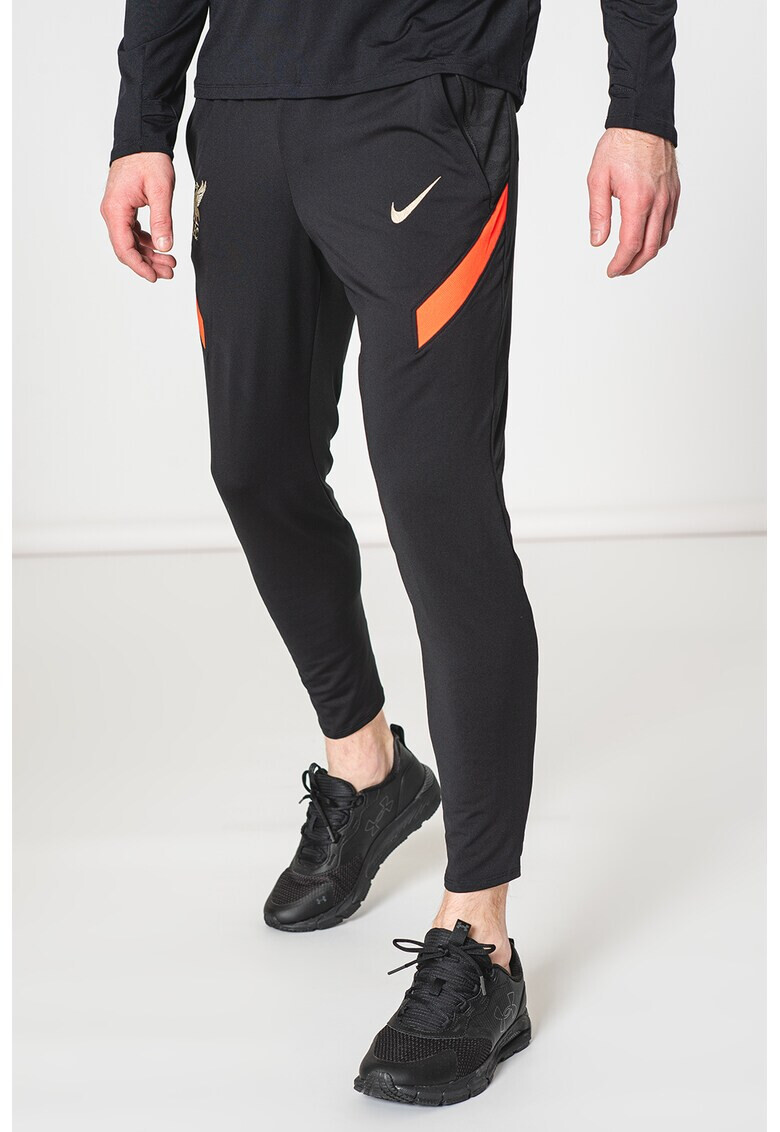 Nike Pantaloni slim fit pentru fotbal Liverpool F.C. Strike - Pled.ro