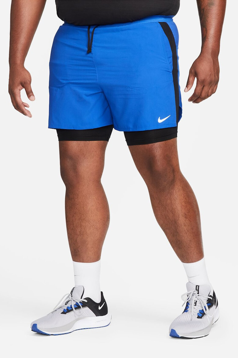 Nike Pantaloni scurti cu buzunare laterale si tehnologie Dri-Fit pentru alergare Stride - Pled.ro