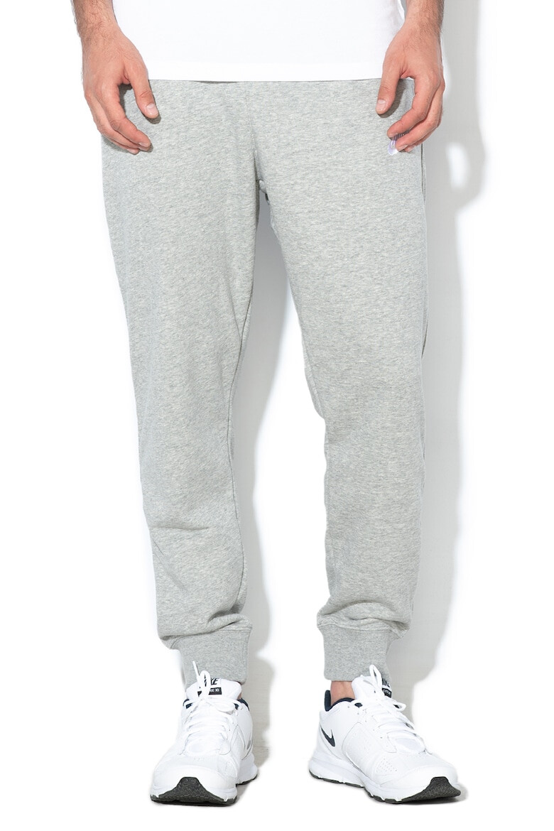 Nike Pantaloni de trening conici cu buzunare laterale Sportswear Club - Pled.ro