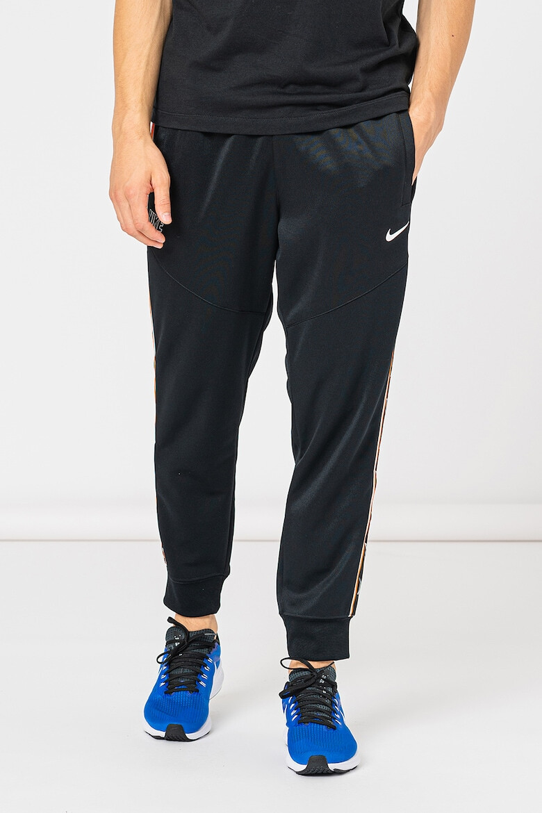 Nike Pantaloni de trening cu logo contrastant Repeat - Pled.ro