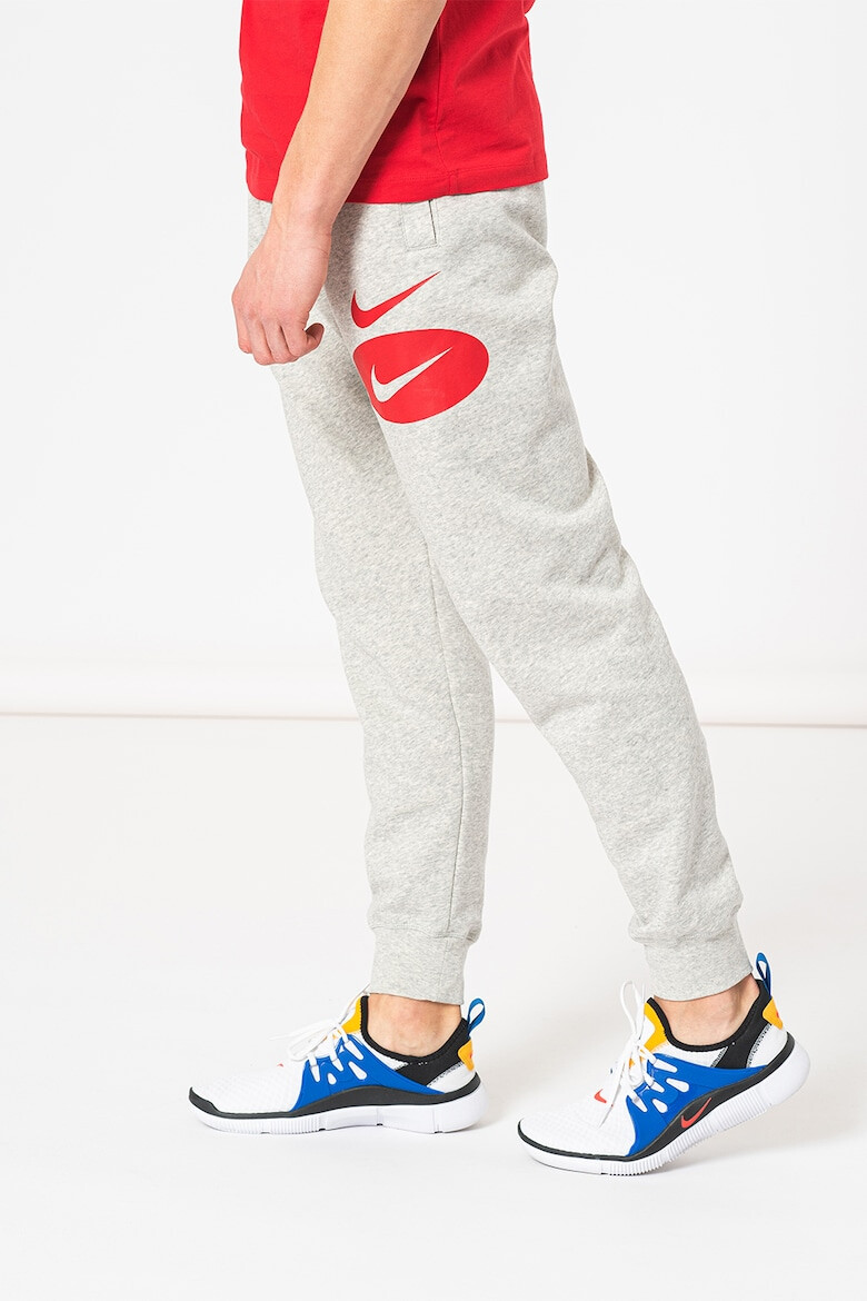 Nike Pantaloni sport cu imprimeu logo contrastant - Pled.ro