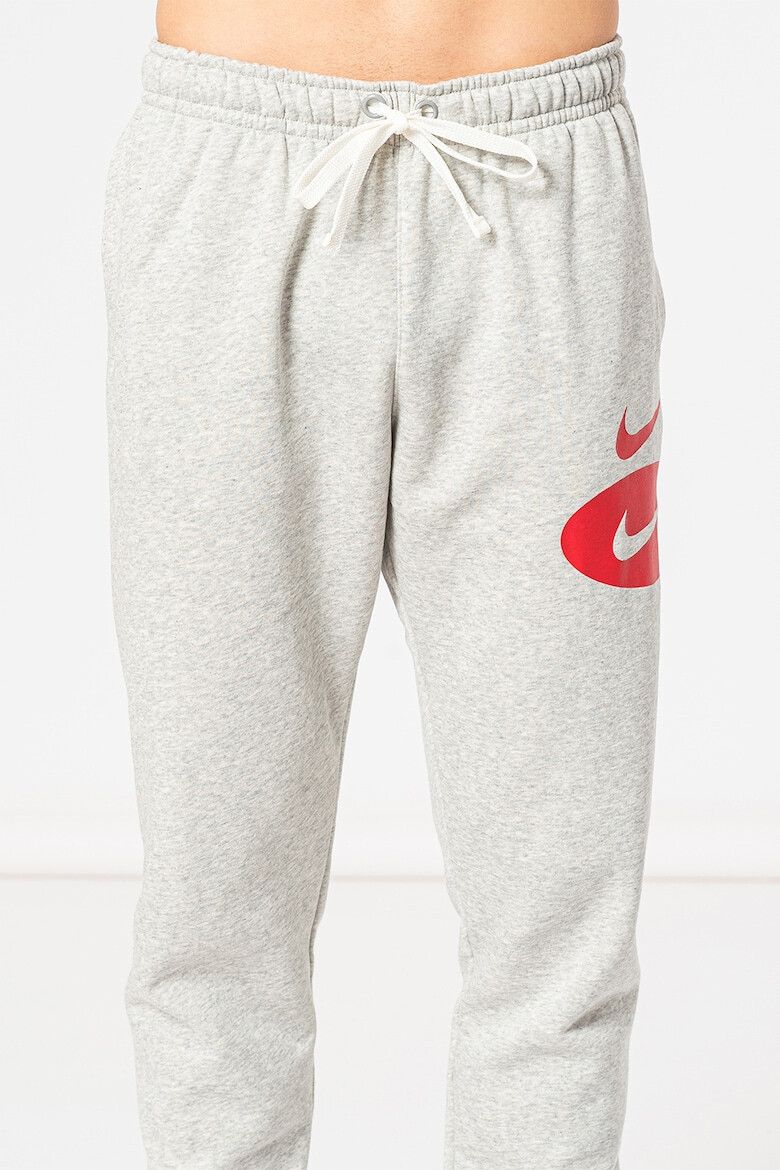 Nike Pantaloni sport cu imprimeu logo contrastant - Pled.ro