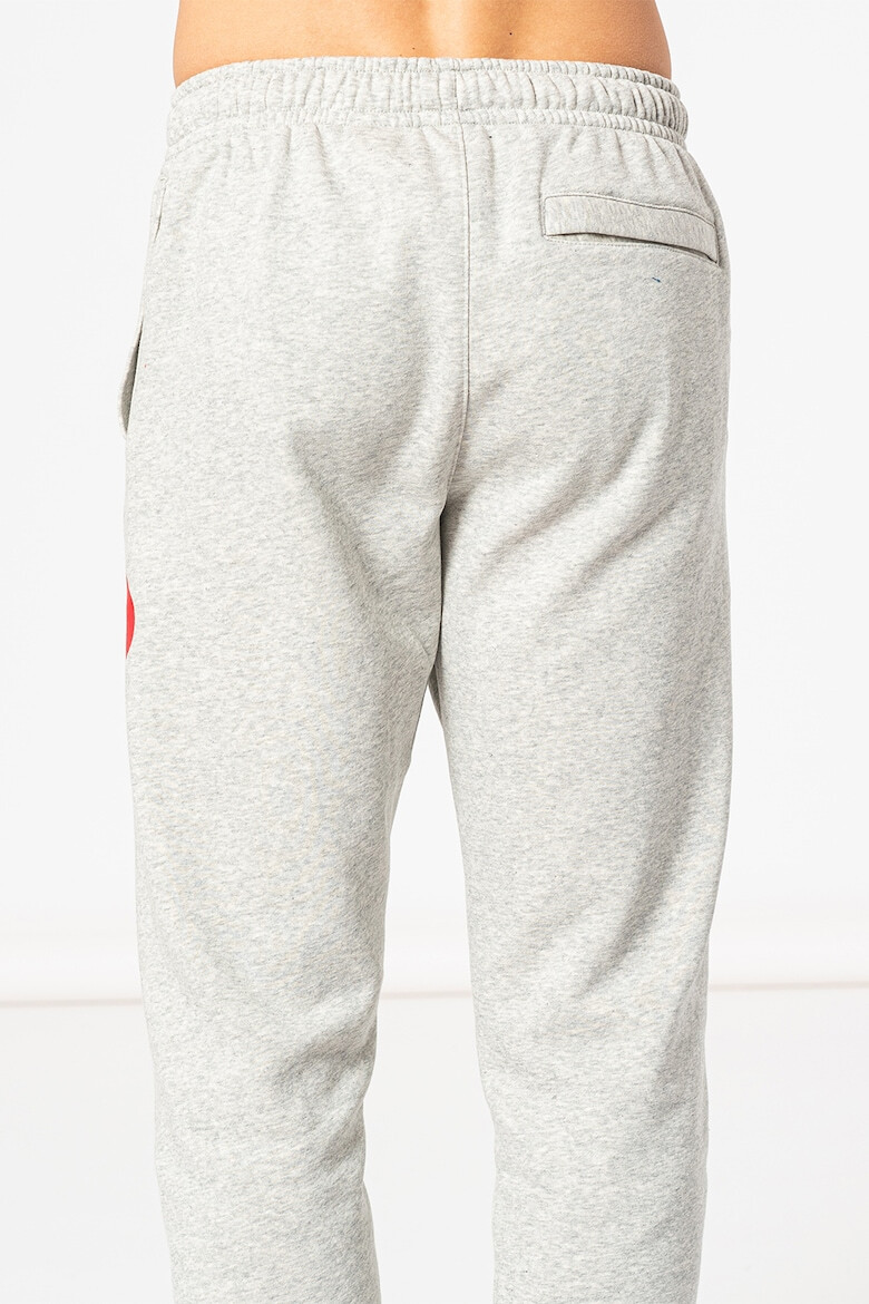 Nike Pantaloni sport cu imprimeu logo contrastant - Pled.ro