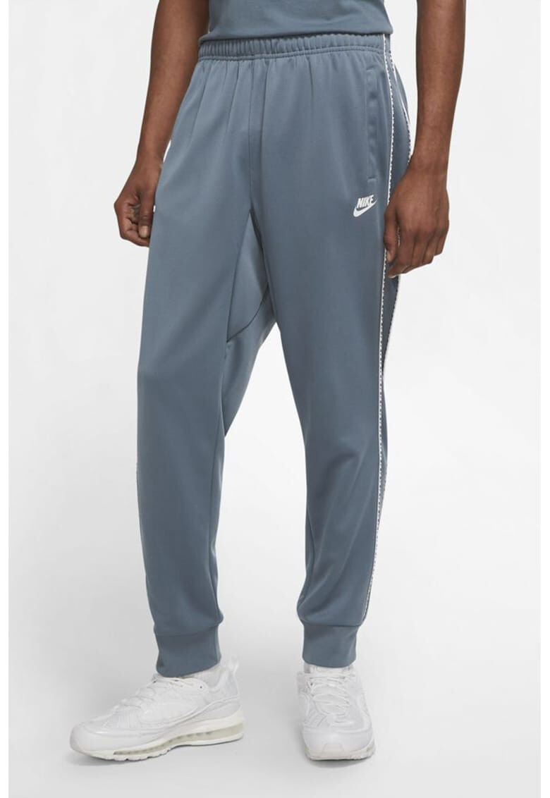 Nike Pantaloni sport cu logo Repeat - Pled.ro