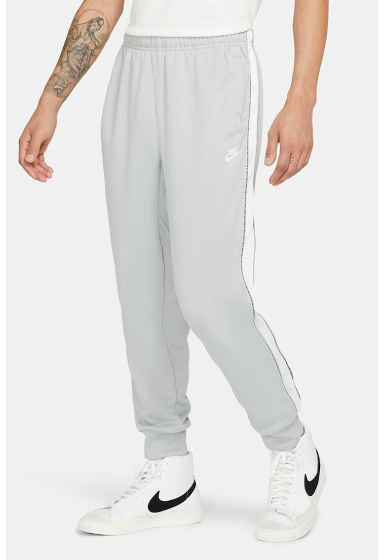 Nike Pantaloni sport cu logo Repeat - Pled.ro