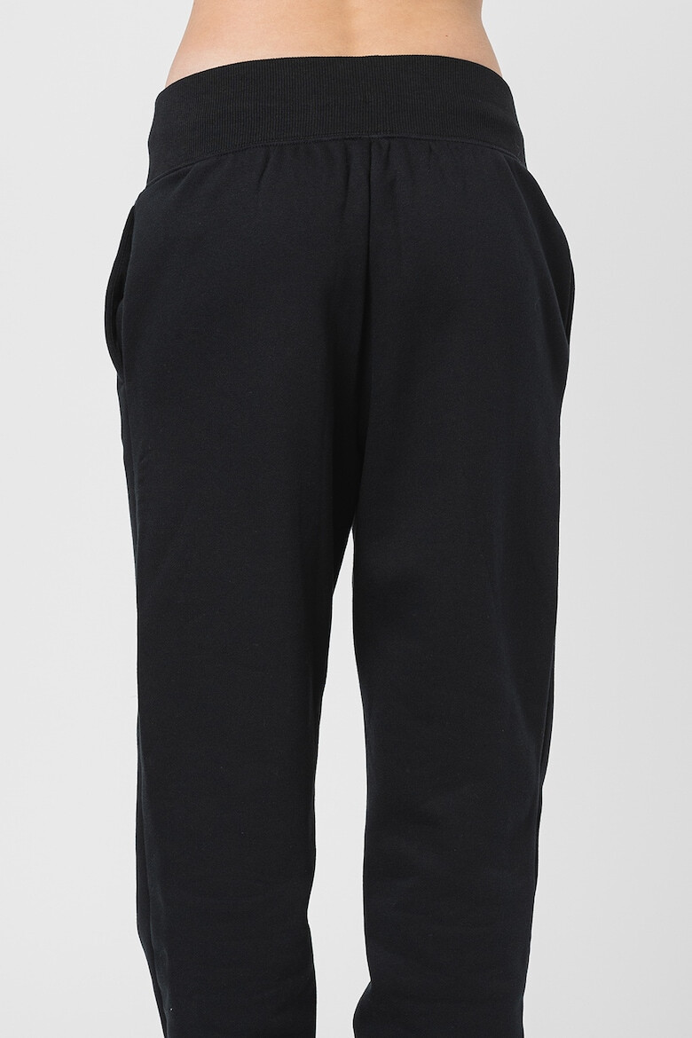 Nike Pantaloni sport cu logo Swoosh - Pled.ro