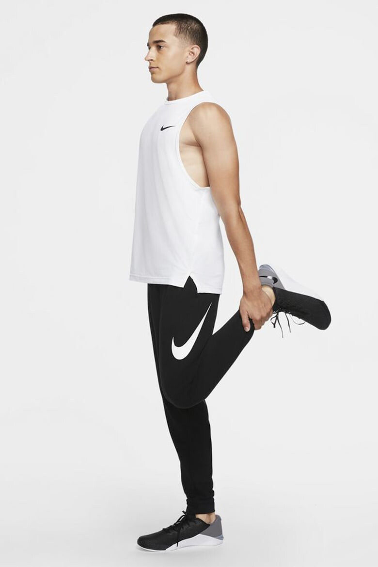 Nike Pantaloni de trening cu tehnologie Dri-Fit pentru fitness - Pled.ro