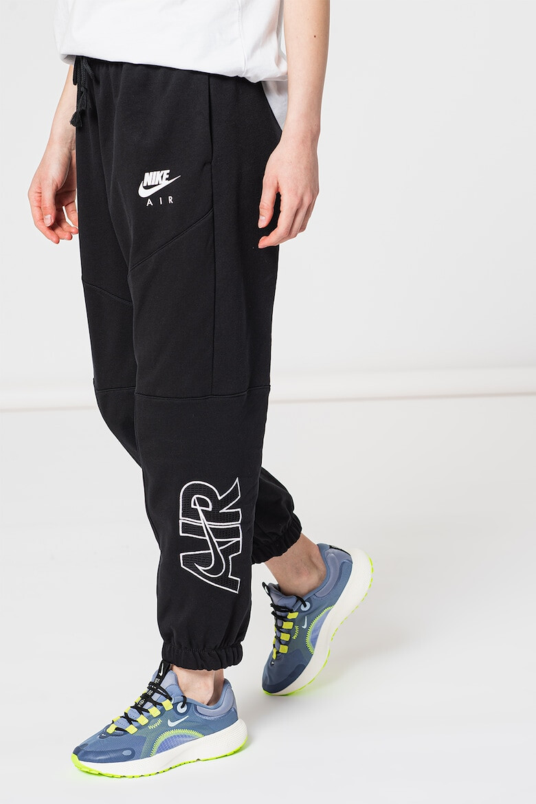 Nike Pantaloni sport lejeri cu buzunare Air - Pled.ro