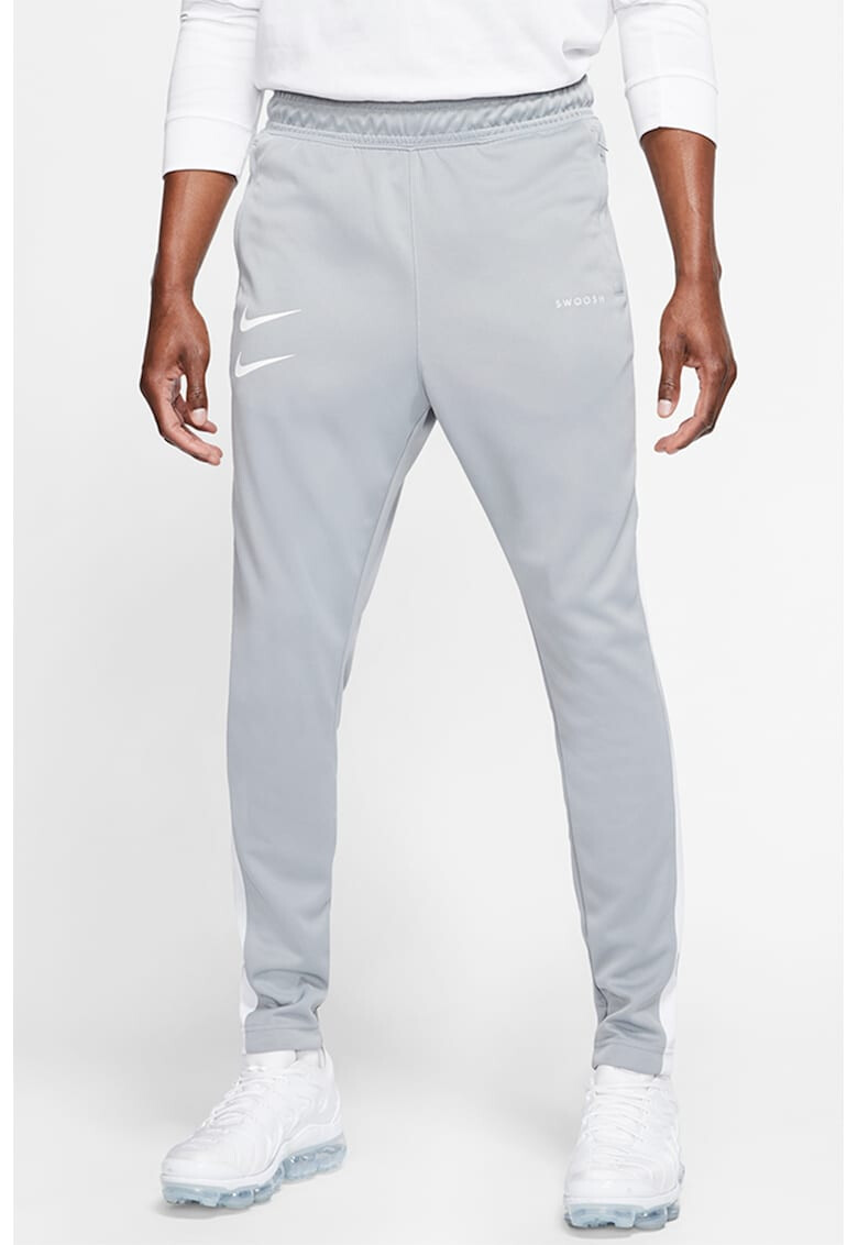 Nike Pantaloni sport conici Swoosh - Pled.ro