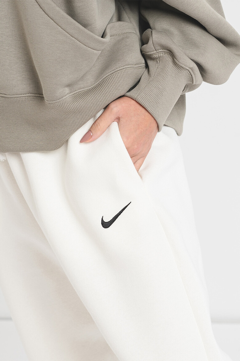 Nike Pantaloni supradimensionati de trening cu talie inalta - Pled.ro