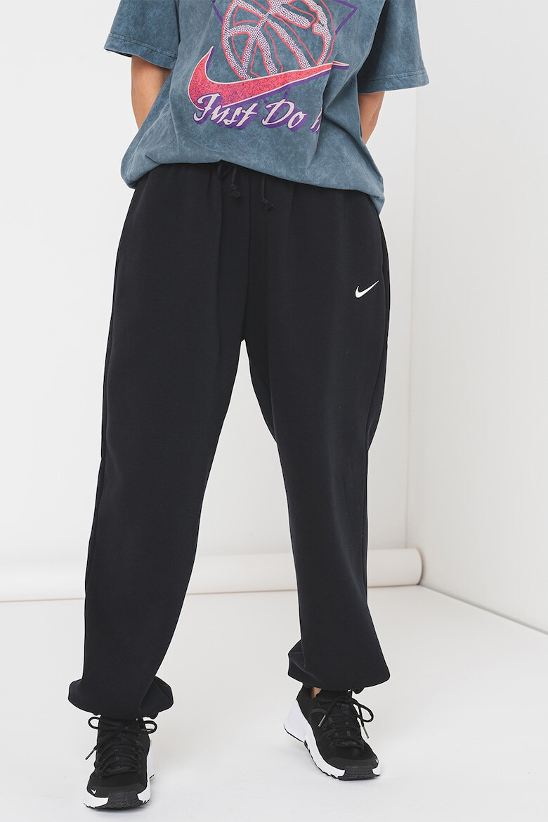 Nike Pantaloni supradimensionati de trening cu talie inalta - Pled.ro