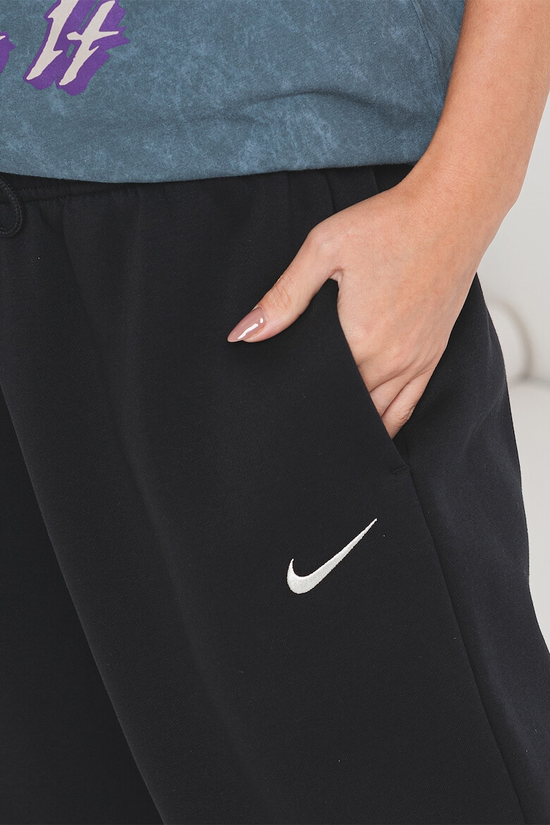 Nike Pantaloni supradimensionati de trening cu talie inalta - Pled.ro