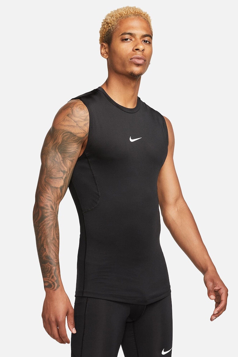 Nike Top cu tehnologie Dri-Fit pentru fitness - Pled.ro