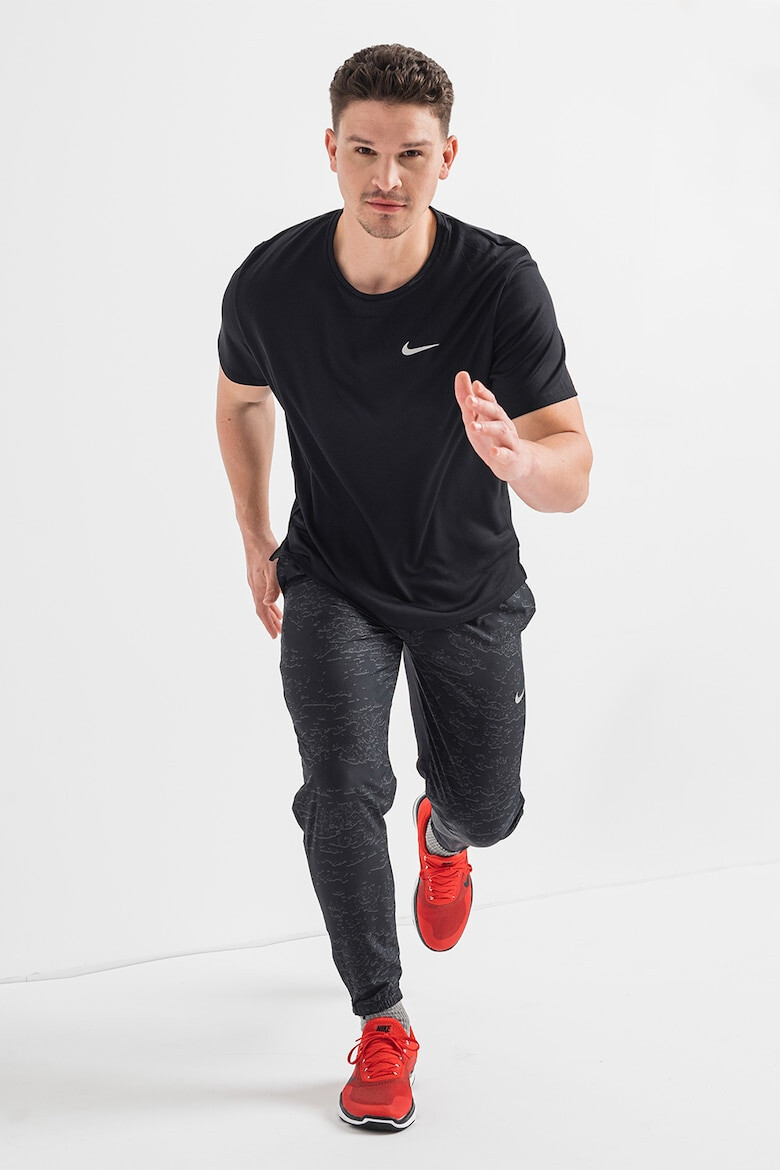 Nike Tricou cu tehnologie Dri-Fit pentru alergare UV Miler - Pled.ro