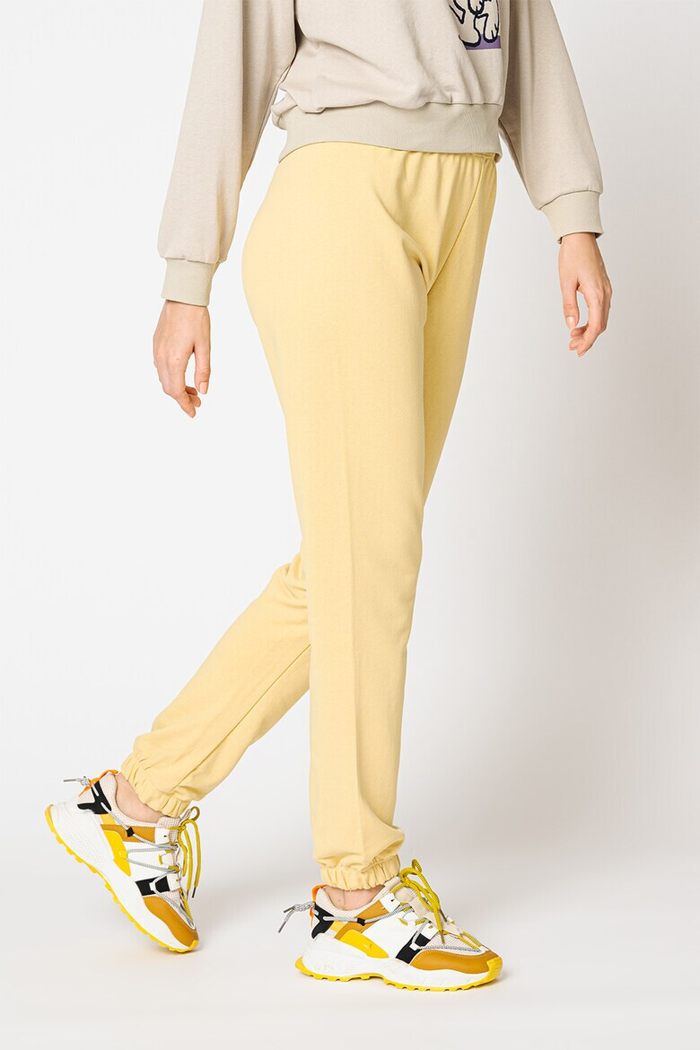 Only Pantaloni sport cu imprimeu grafic Peanuts - Pled.ro