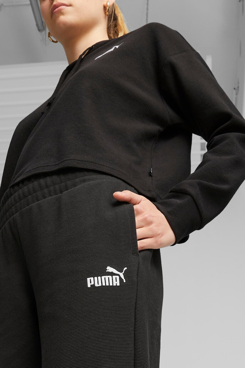 Puma Pantaloni conici de trening cu buzunare laterale Essentials Elavated - Pled.ro