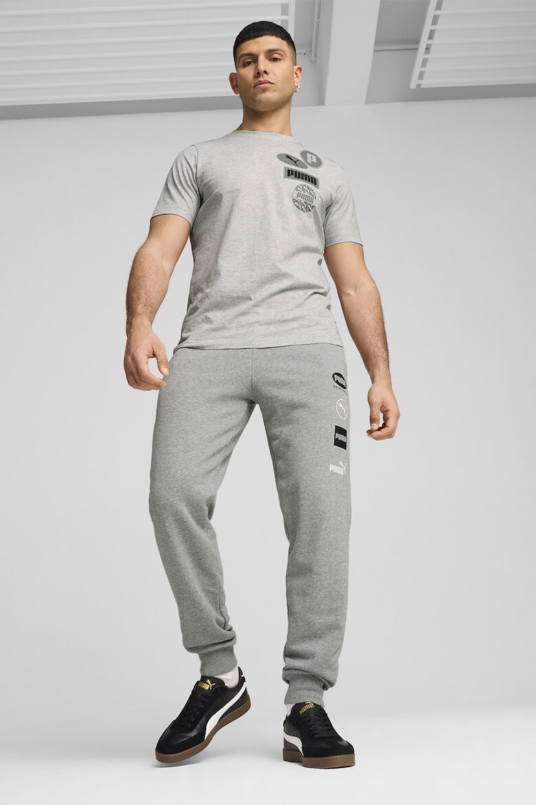 Puma Pantaloni conici de trening cu logo Power - Pled.ro