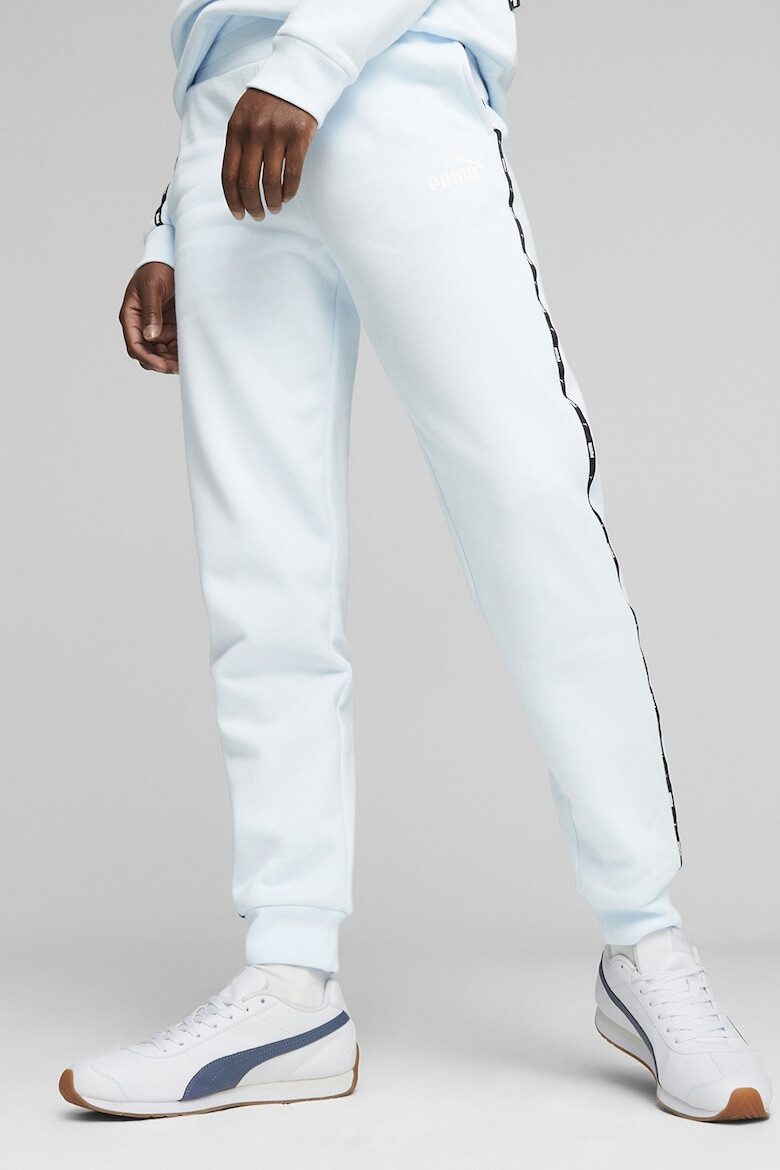 Puma Pantaloni de trening cu benzi laterale cu logo Essentials - Pled.ro