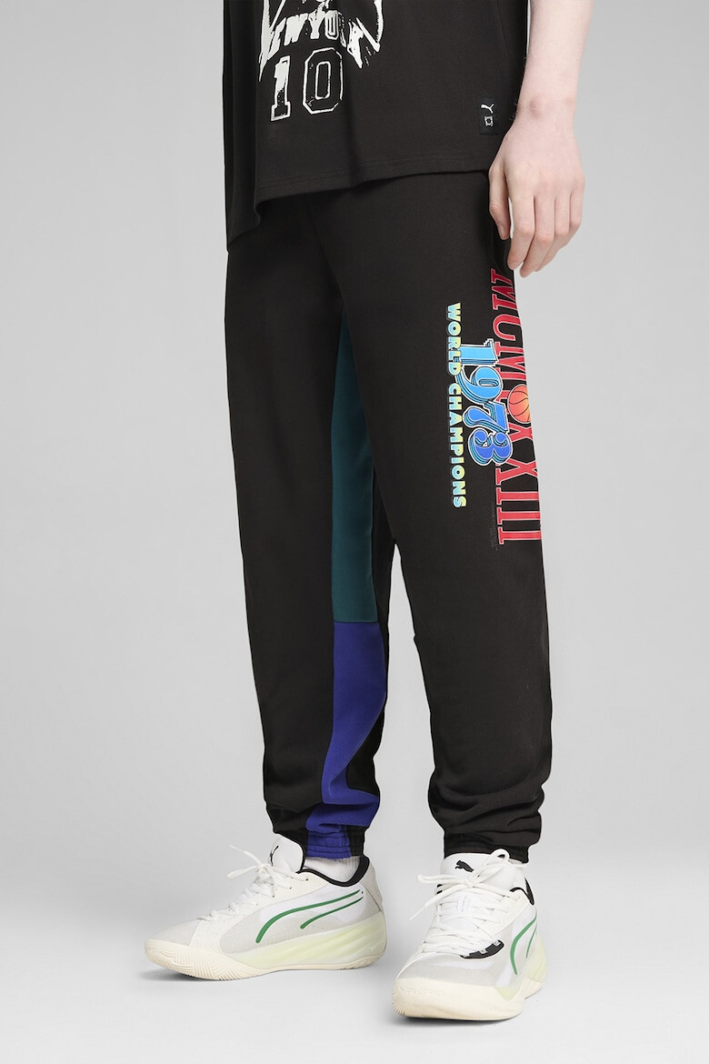 Puma Pantaloni de trening cu logo Bandwagon - Pled.ro