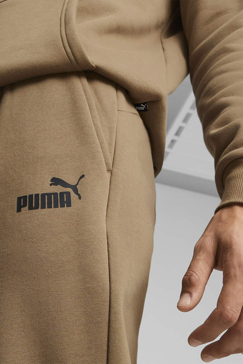 Puma Pantaloni de trening cu logo Essentials - Pled.ro