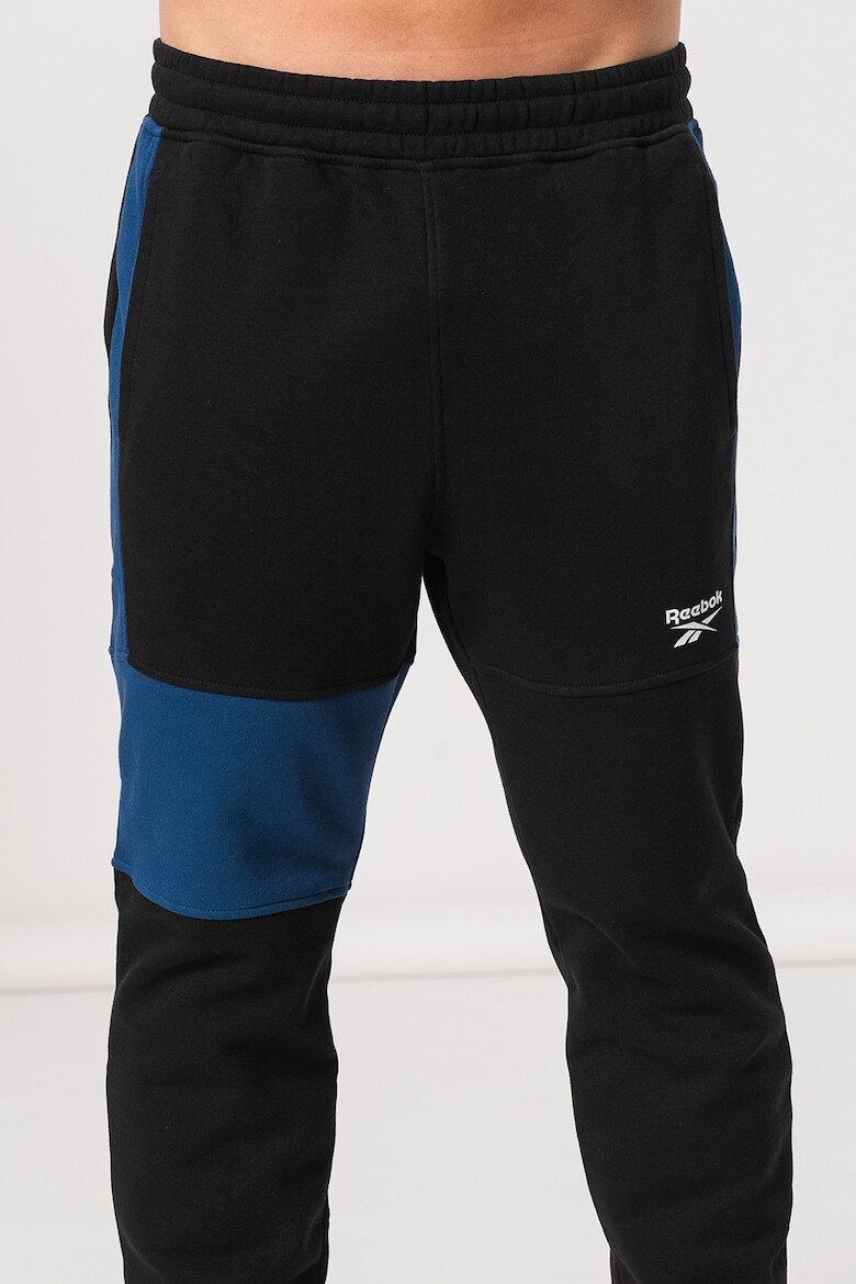 Reebok Pantaloni cu logo pentru fitness Panel - Pled.ro