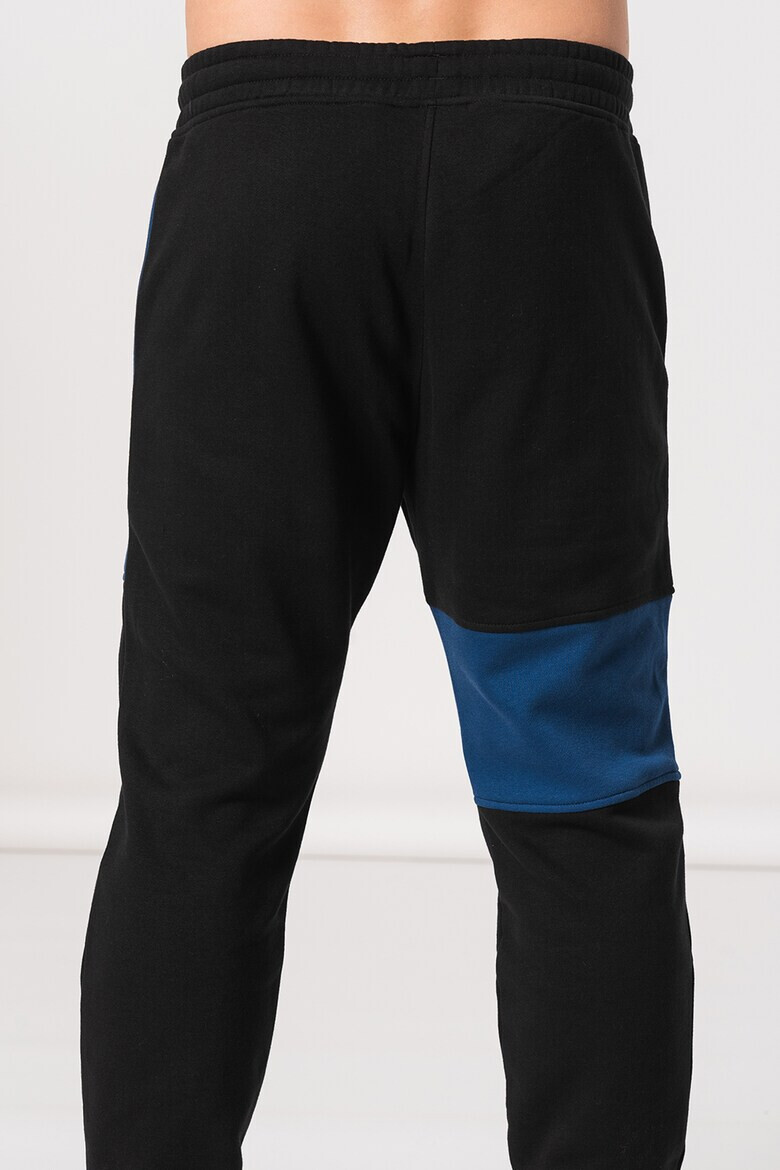 Reebok Pantaloni cu logo pentru fitness Panel - Pled.ro