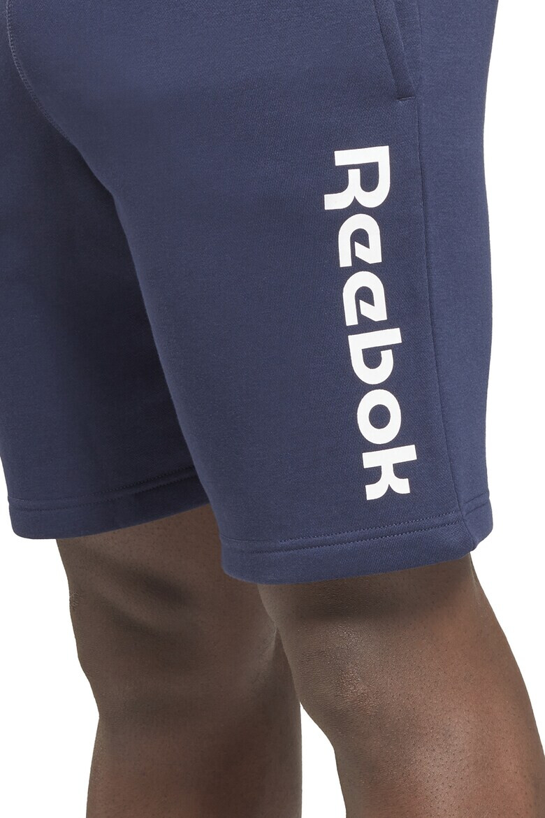 Reebok Pantaloni scurti cu buzunare laterale si logo pentru antrenament - Pled.ro