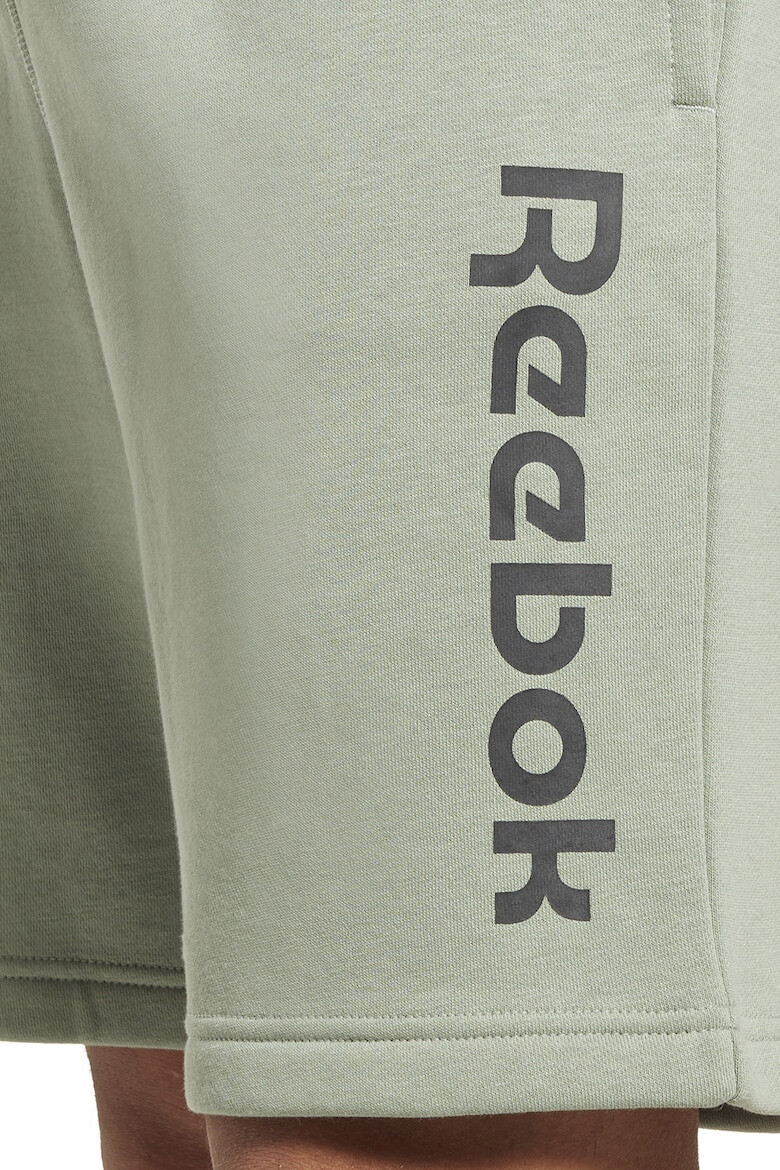 Reebok Pantaloni scurti cu buzunare laterale si logo pentru antrenament - Pled.ro