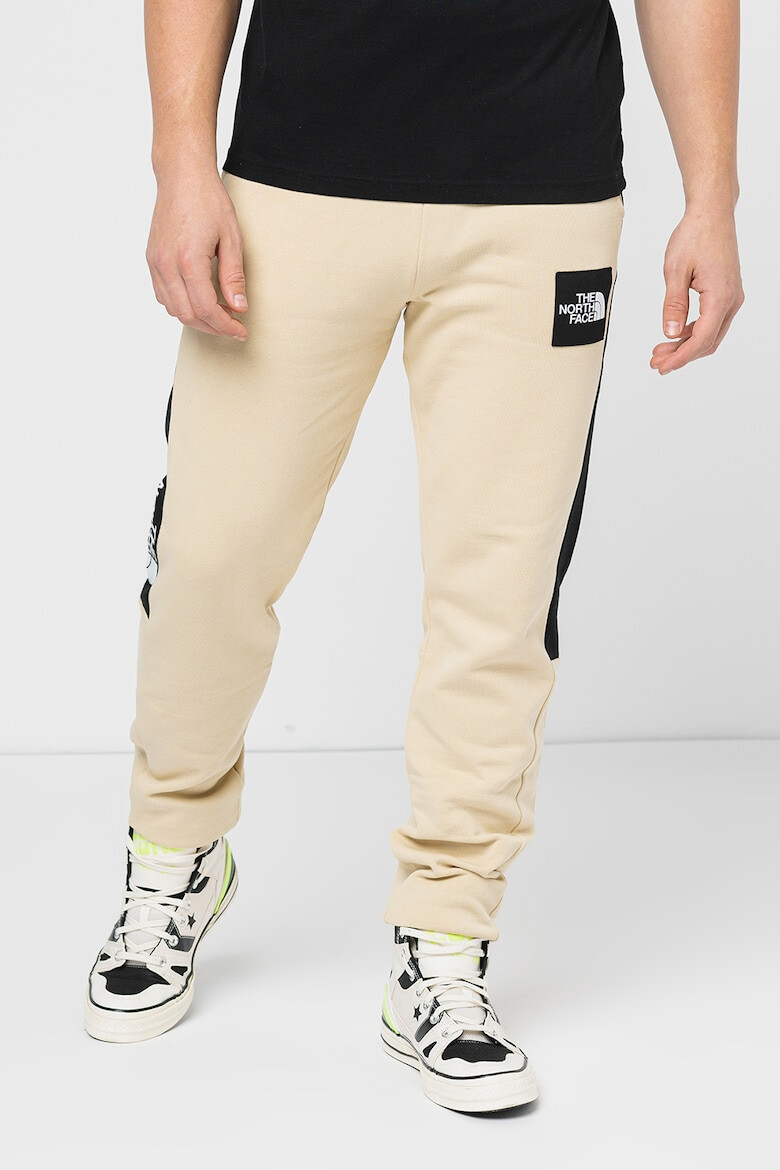 The North Face Pantaloni cu benzi laterale contrastante Fine Alpine - Pled.ro