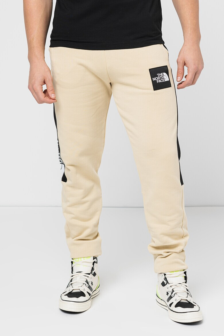 The North Face Pantaloni cu benzi laterale contrastante Fine Alpine - Pled.ro