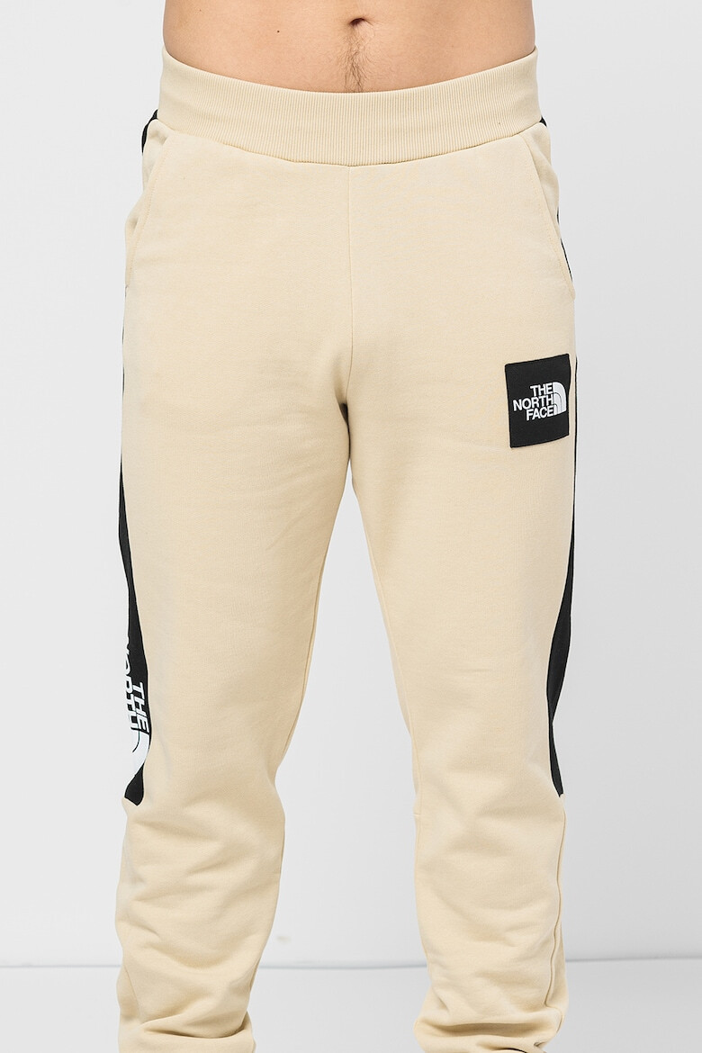 The North Face Pantaloni cu benzi laterale contrastante Fine Alpine - Pled.ro