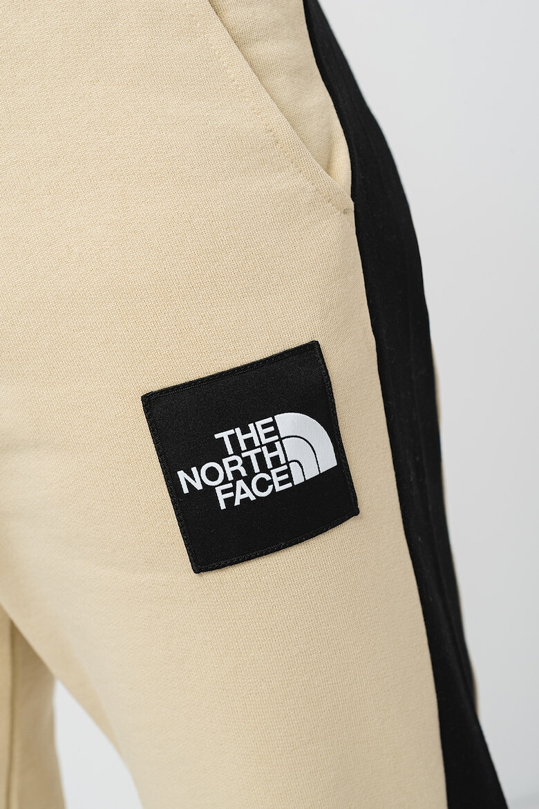 The North Face Pantaloni cu benzi laterale contrastante Fine Alpine - Pled.ro