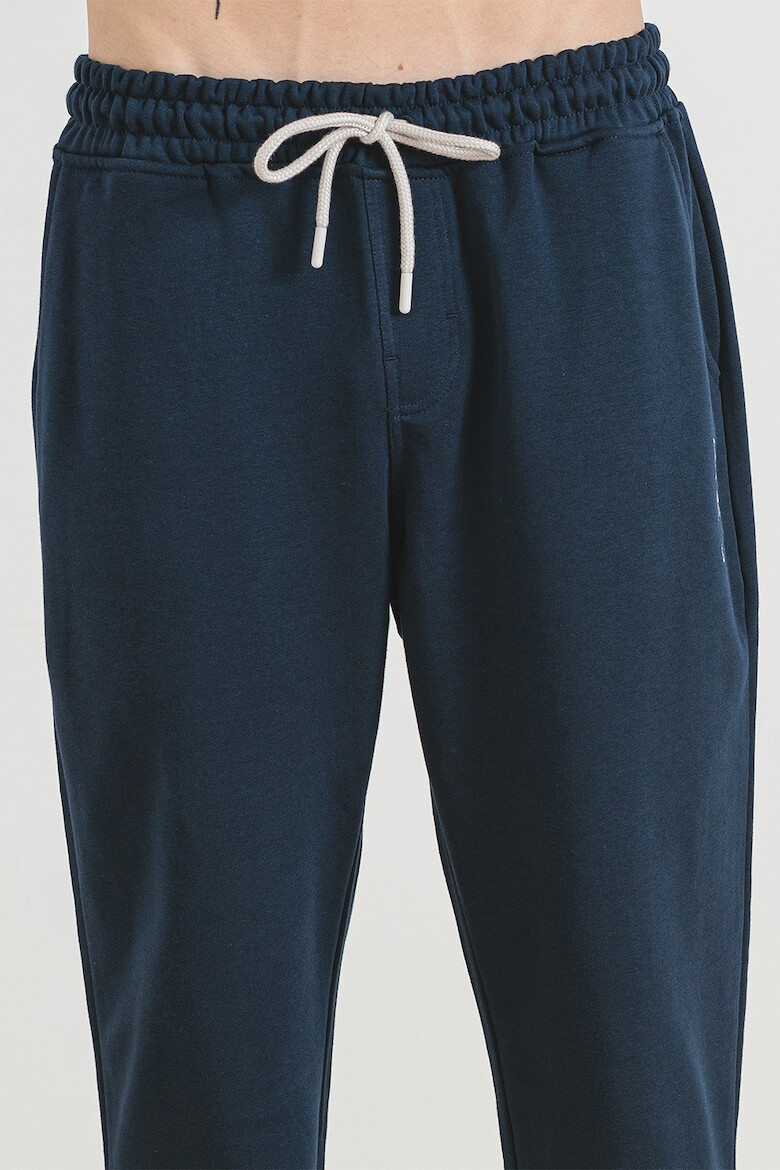 U.S. Polo Assn. Pantaloni de trening din amestec de bumbac cu croiala ampla - Pled.ro