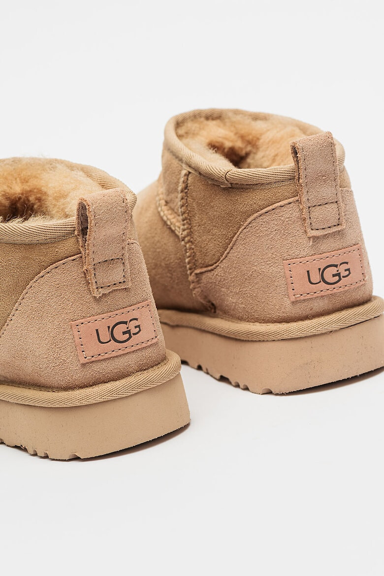 UGG Ghete slip-on de piele intoarsa cu finisaj rezistent la apa Classic Ultra Mini - Pled.ro