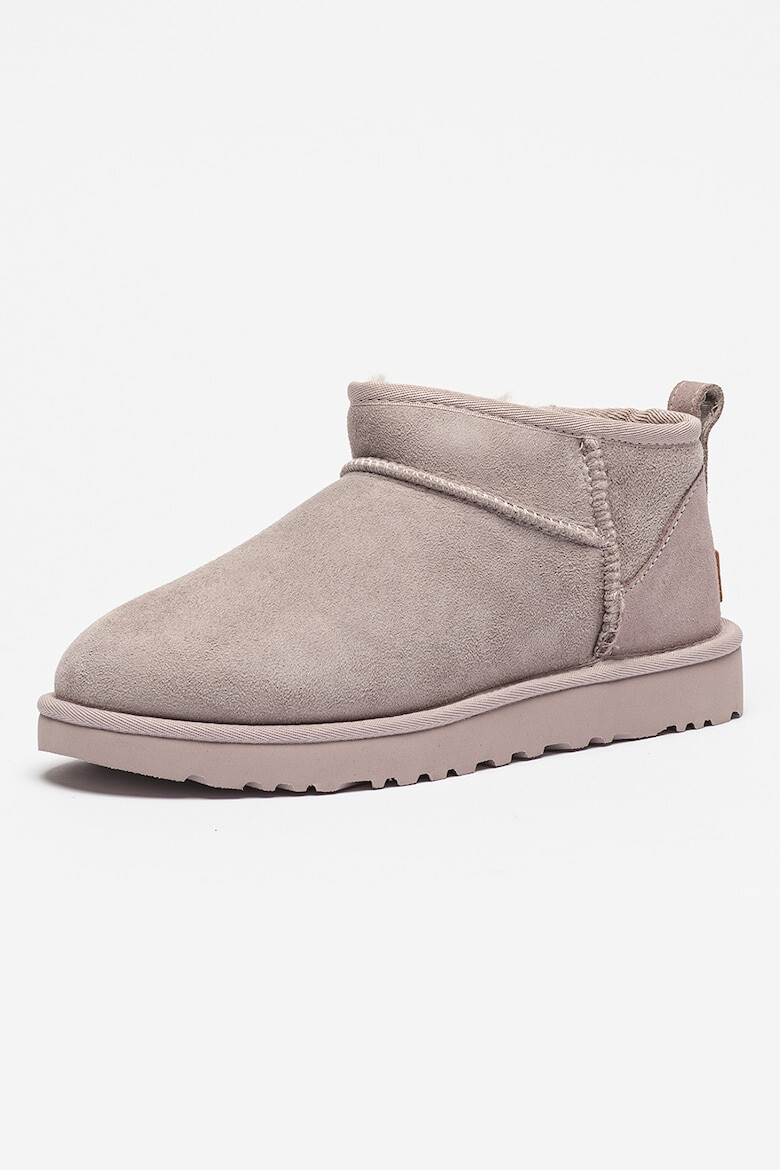 UGG Ghete slip-on de piele intoarsa cu finisaj rezistent la apa Classic Ultra Mini - Pled.ro