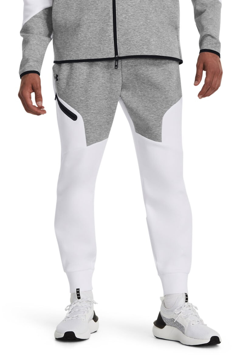 Under Armour Pantaloni conici cu uscare rapida pentru fitness Unstoppable - Pled.ro