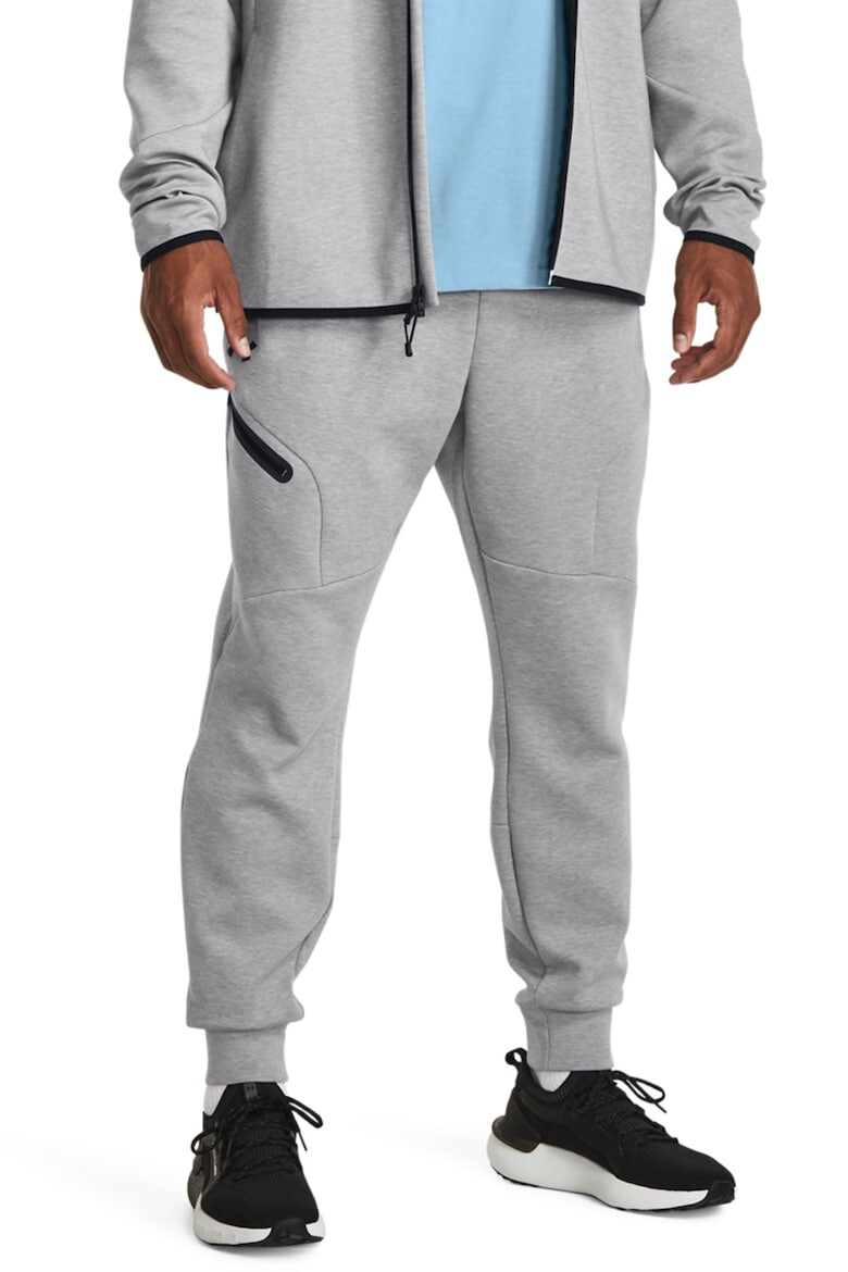 Under Armour Pantaloni conici cu uscare rapida pentru fitness Unstoppable - Pled.ro