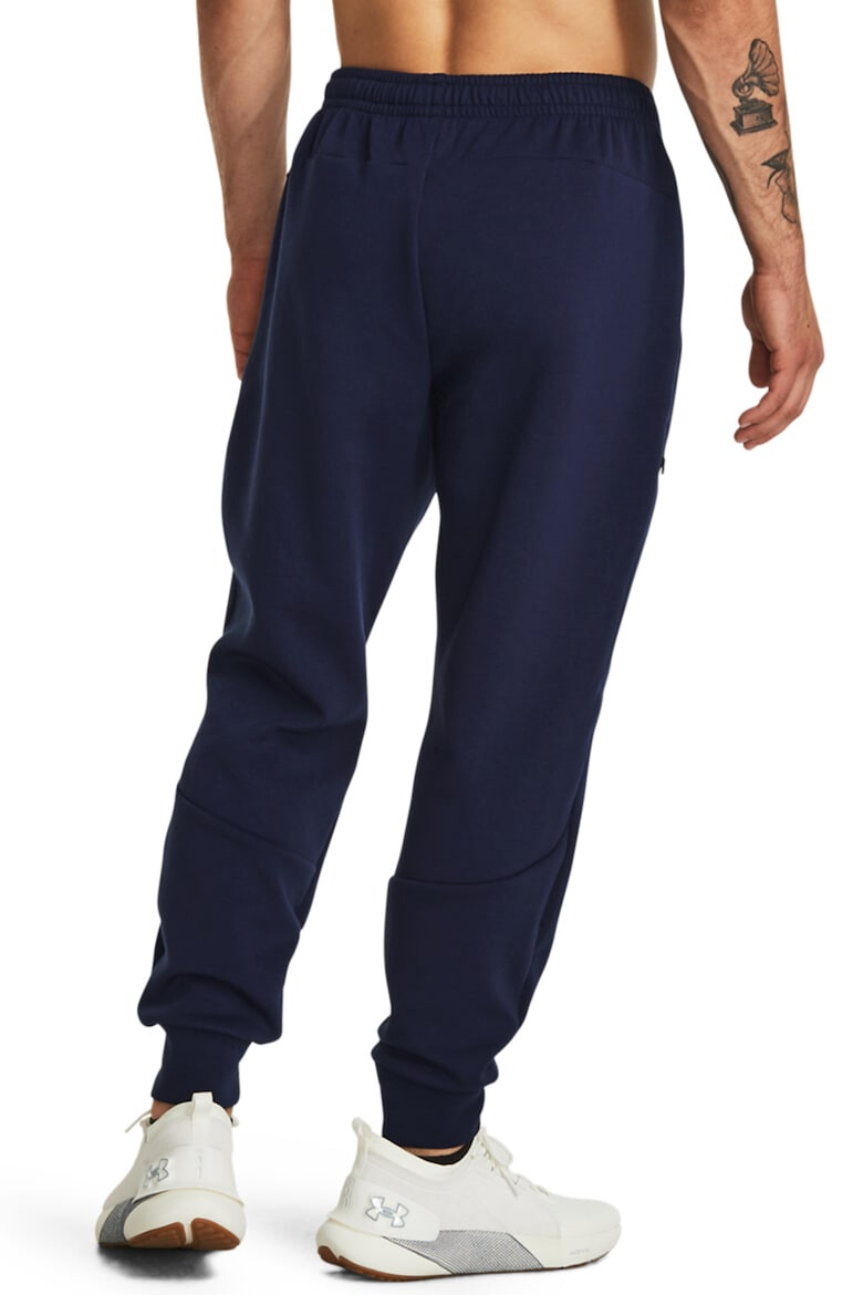 Under Armour Pantaloni conici cu uscare rapida pentru fitness Unstoppable - Pled.ro