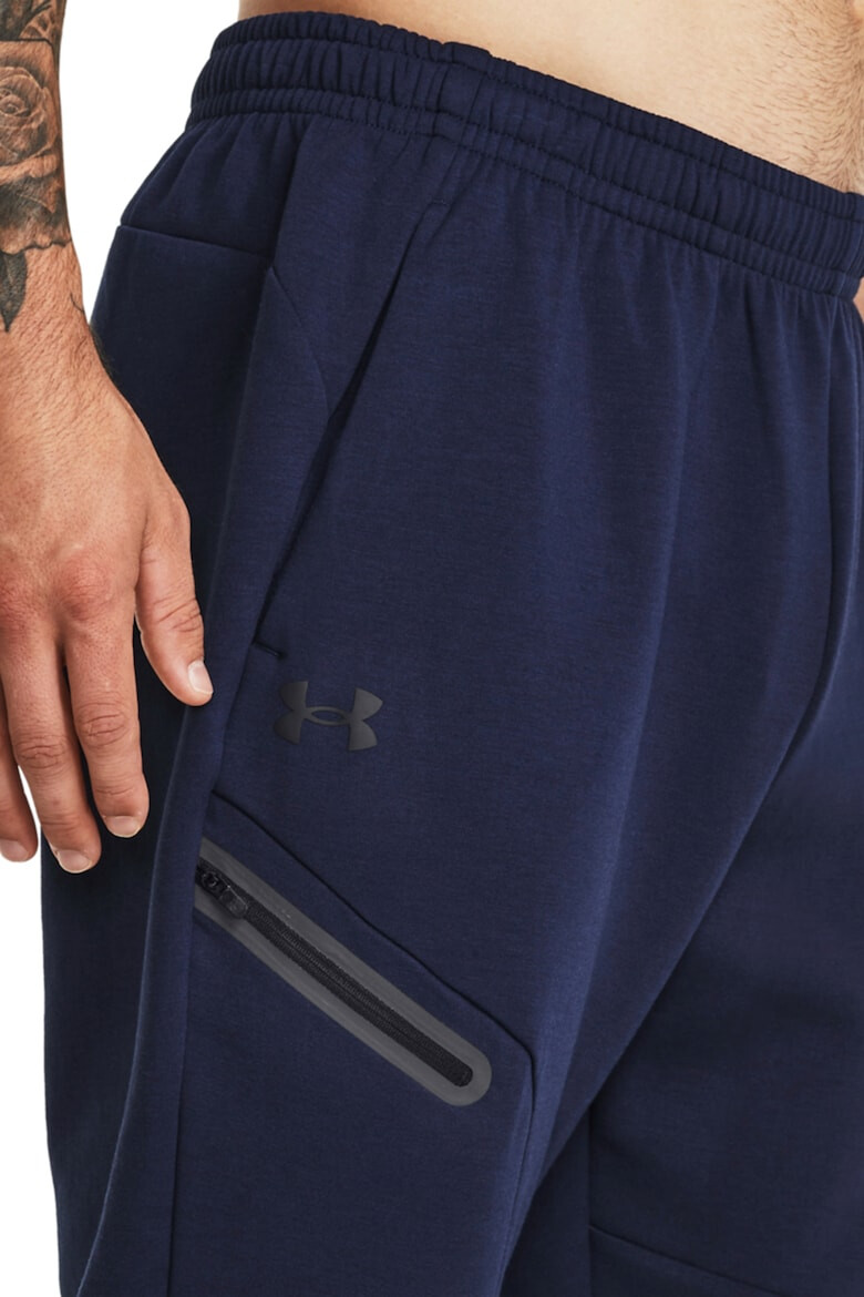 Under Armour Pantaloni conici cu uscare rapida pentru fitness Unstoppable - Pled.ro