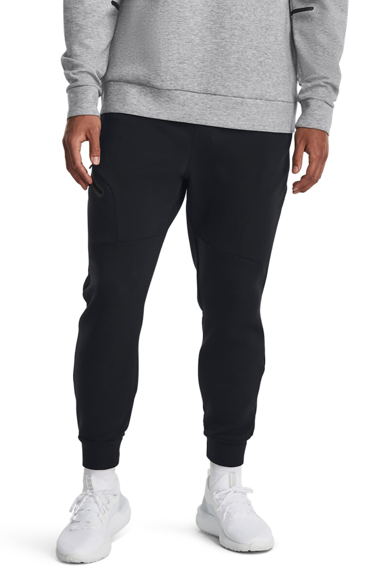 Under Armour Pantaloni conici cu uscare rapida pentru fitness Unstoppable - Pled.ro