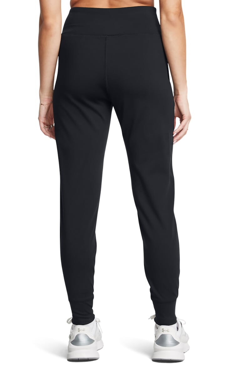 Under Armour Pantaloni cu buzunare pentru fitness Motion - Pled.ro