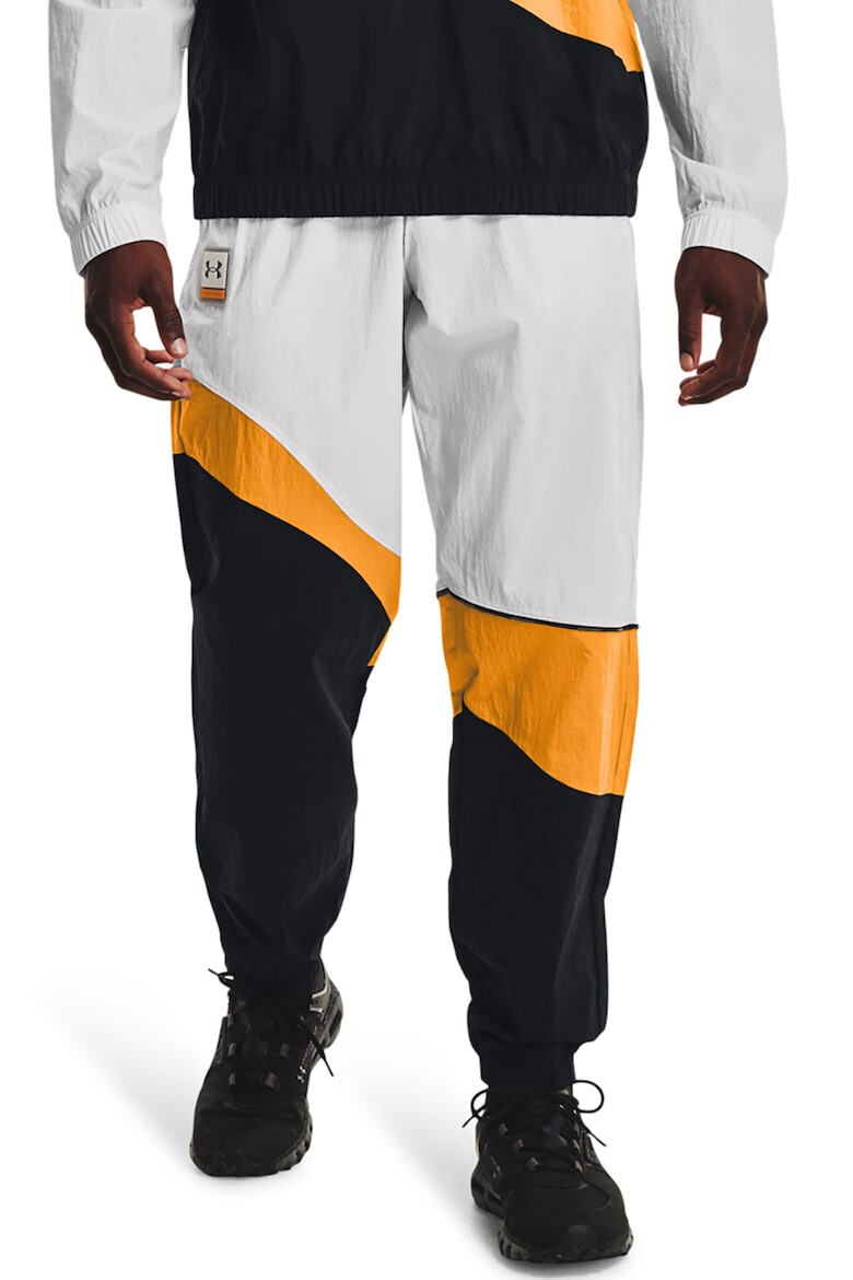 Under Armour Pantaloni cu model colorblock pentru fitness - Pled.ro