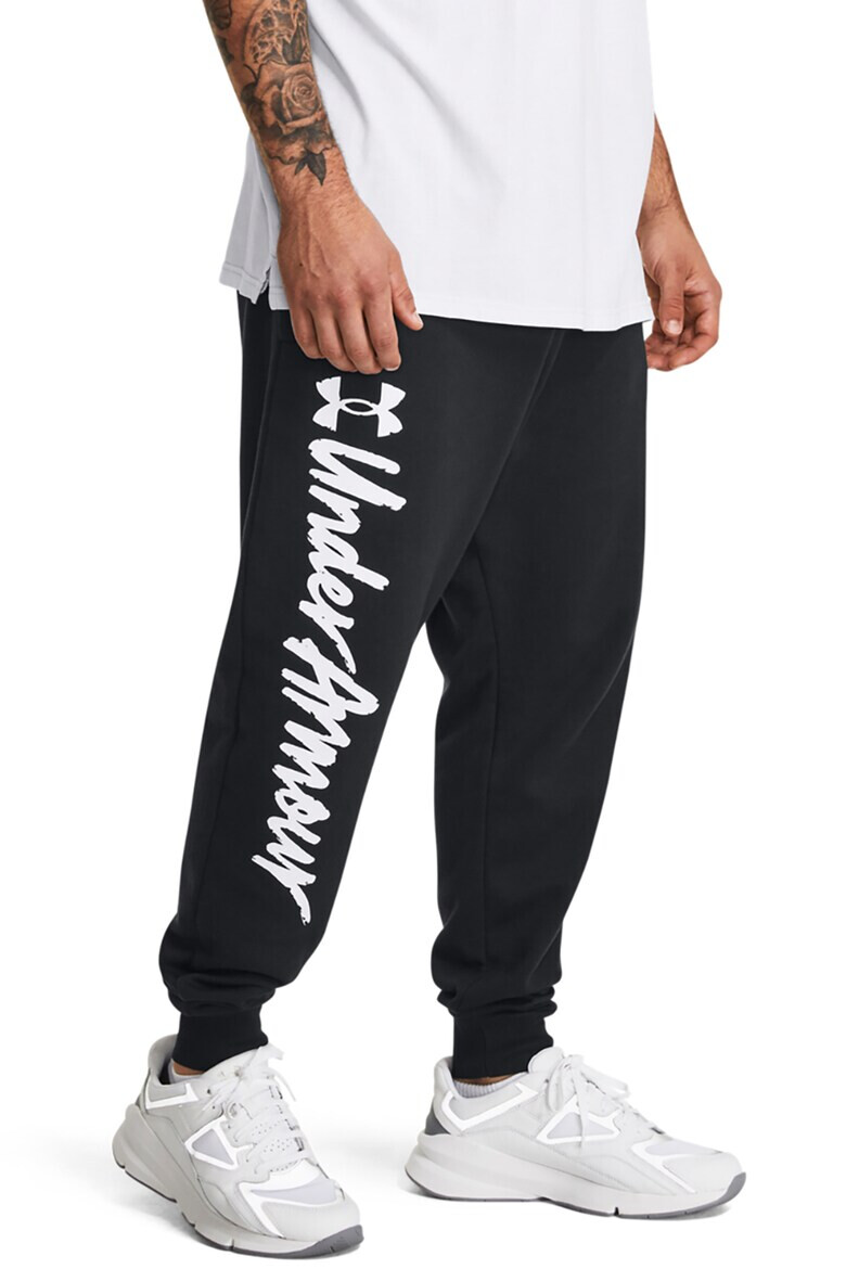 Under Armour Pantaloni sport conici pentru fitness Rival Fleece Graphic - Pled.ro