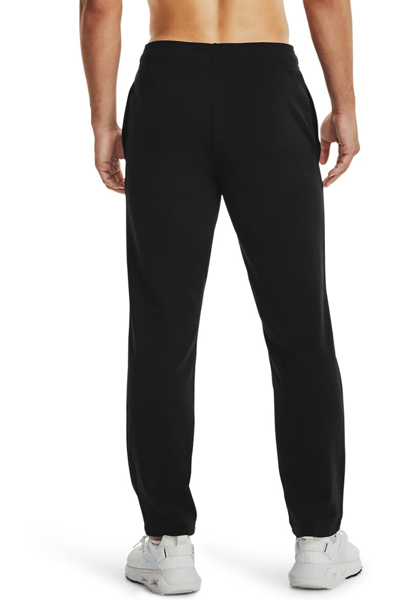 Under Armour Pantaloni sport cu buzunare laterale si logo pentru fitness Rival - Pled.ro