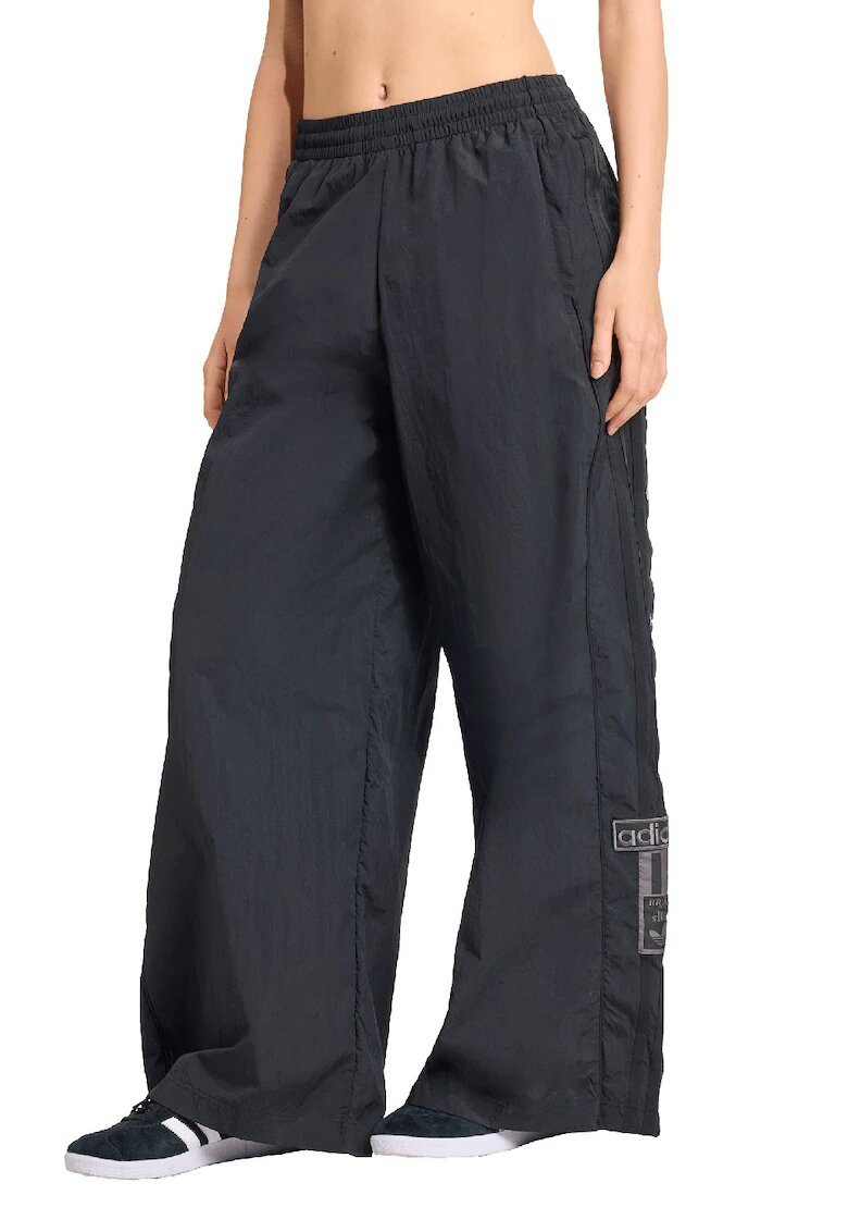adidas Originals Pantaloni de trening cu croiala ampla si capse laterale - Negru