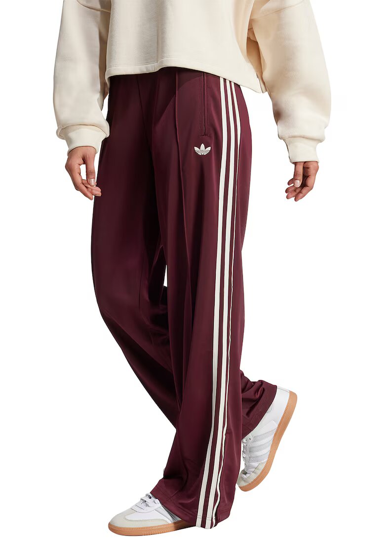 adidas Originals Pantaloni de trening cu croiala lejera si buzunare cu fermoar Firebird - Violet pruna