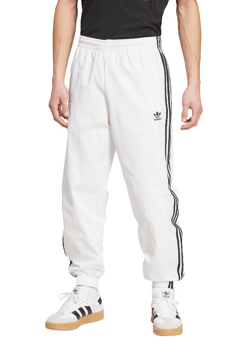 adidas Originals Pantaloni de trening cu terminatii cu fermoar Firebird - Alb/Negru stins
