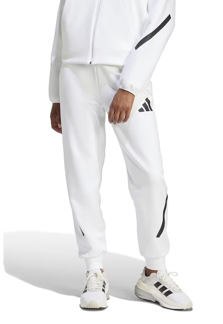ADIDAS SPORTSWEAR Pantaloni de trening cu buzunare cu fermoar Z.N.E. - Alb/Negru