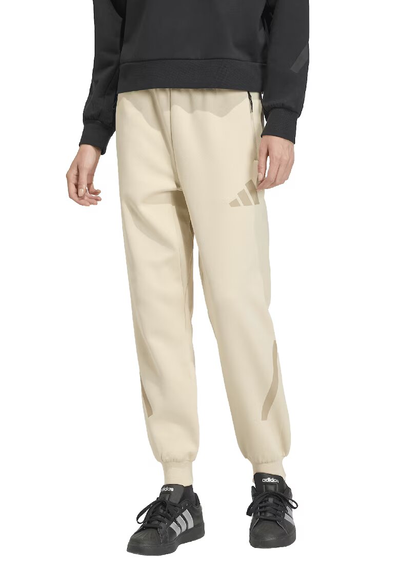 ADIDAS SPORTSWEAR Pantaloni de trening cu buzunare cu fermoar Z.N.E. - Bej deschis