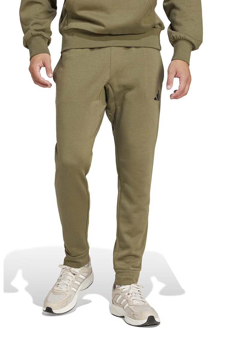 ADIDAS SPORTSWEAR Pantaloni de trening cu snur in talie si croiala conica FeelCozy - Negru/Verde sparanghel